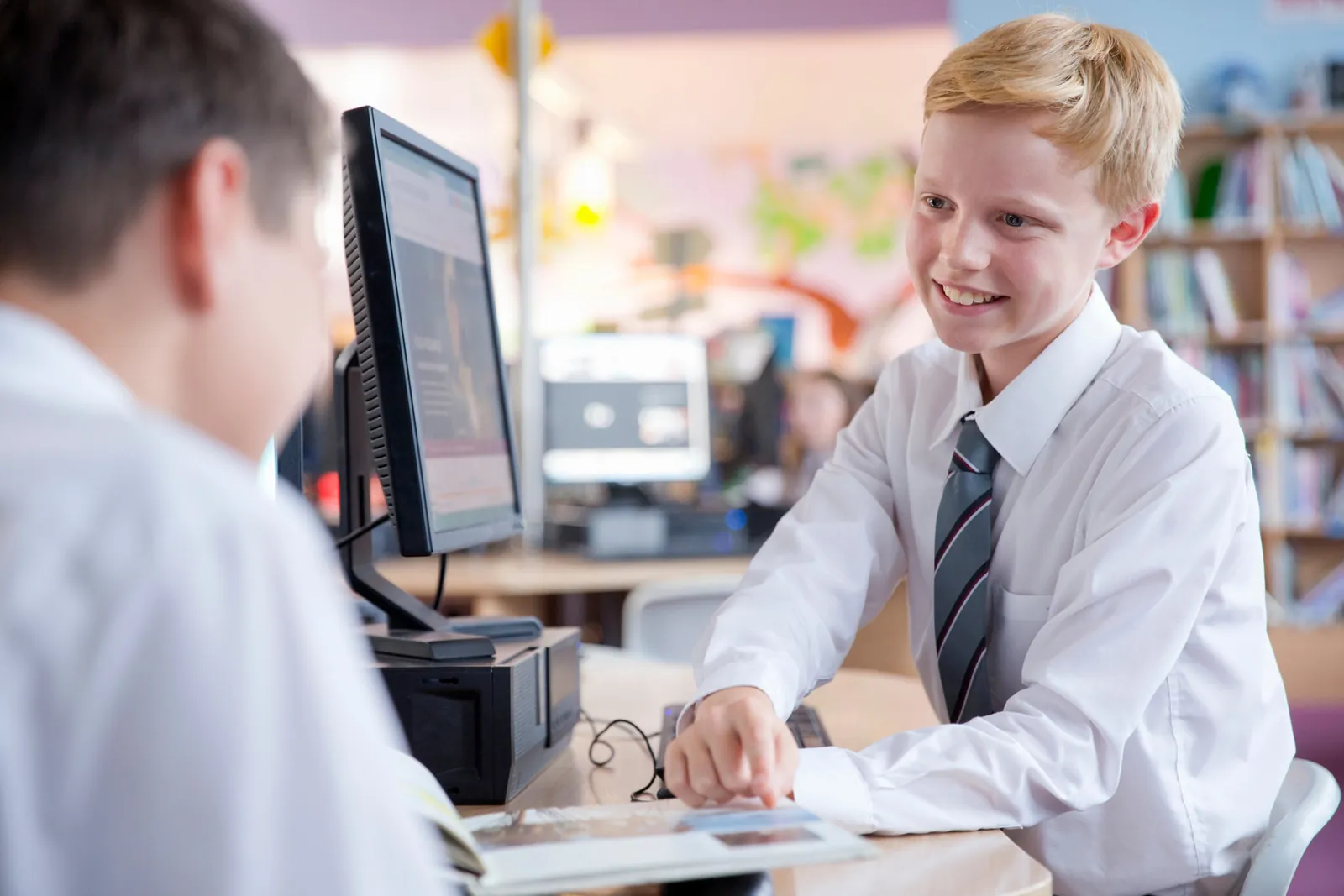 Pupils working at classroom computers